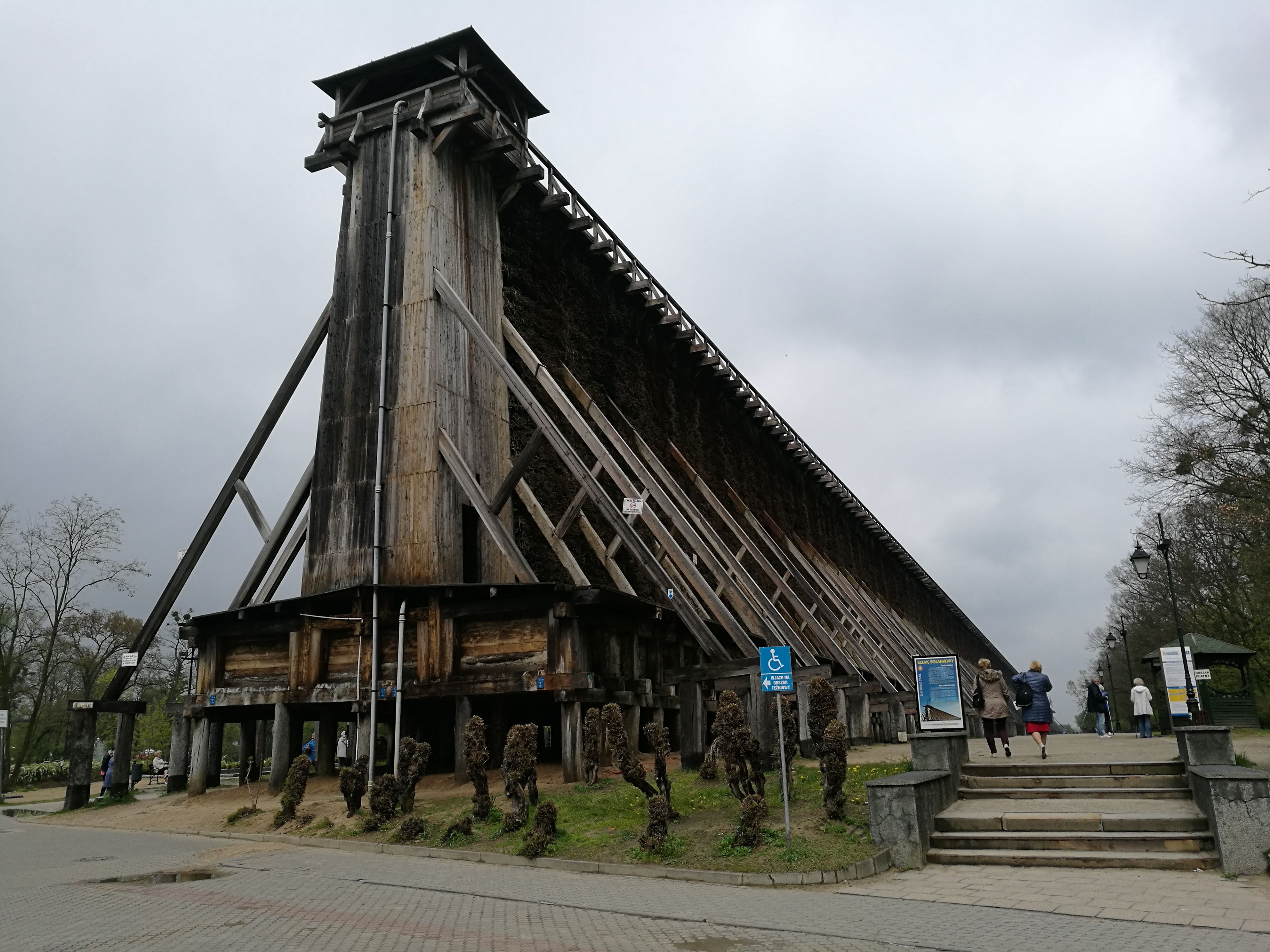 A large wooden structure that is very long and disappears into the distance.